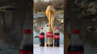 Coke vs Mentos Fountain in slow motion experiment [upl. by Ateuqirne]