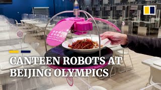 Canteen robots serve noodles at Beijing Olympic Winter Games [upl. by Ewald]