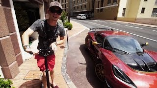 ELECTRIC SCOOTER VS LOTUS 380 IN MONACO [upl. by Ecerahc]