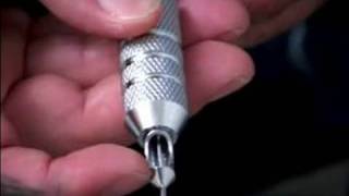 Beginning Tattooing Tips  How to Insert Needles Into Traditional Tattoo Machine [upl. by Paradies]