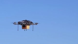 Amazon unveils futuristic minidrone delivery plan [upl. by Kosse497]