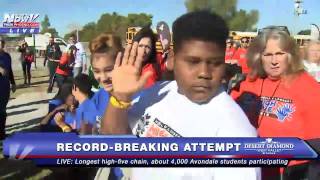 WOW Nearly 4000 Avondale Students BREAK Guinness World Record for LONGEST HighFive Chain  FNN [upl. by Myranda]