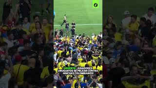 JUGADORES URUGUAYOS se pelean con HINCHAS COLOMBIANOS tras la ELIMINACIÓN de URUGUAY  Depor [upl. by Jillian786]