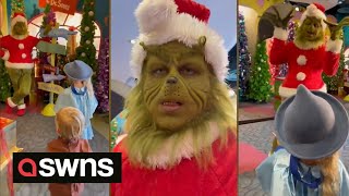 Grinch impersonator has hilarious interaction with two young children  SWNS [upl. by Reeve]