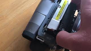 Canon Elura 90 MiniDV Camcorder NTSC 2005  Removing a Mini DV Tape [upl. by Ahsitram]