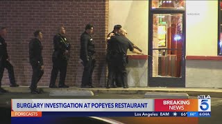 3 masked suspects steal cash from Popeyes restaurant in LA [upl. by Shriver]