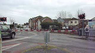 Two trains at Bedhampton level crossing Hampshire [upl. by Tomaso]