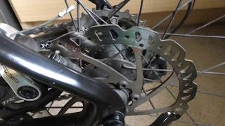 Cleaning bicycle disk brakes [upl. by Ahgiel]