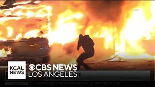 Metro bus lit on fire businesses looted after Dodgers win World Series [upl. by Silvain410]