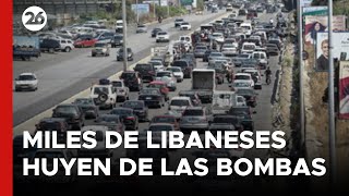 Miles de libaneses huyen de las bombas [upl. by Hannazus]