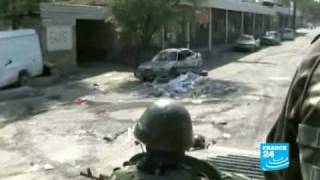 Kyrgyzstan  Uzbekistan Army takes down barricades in burntout Osh [upl. by Arnaud]