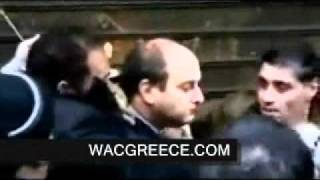 Έφαγε ξύλο ο Κωστής ΧατζηδάκηςGreek Politician Beaten During Riots [upl. by Akcirahs]