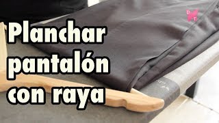 Cómo planchar un pantalón de vestir con raya [upl. by Euqinomad]