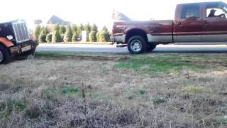 2008 F350 pulls big rig from mud [upl. by Remoh]