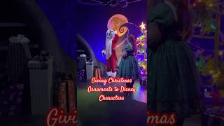 Giving Disney Characters Christmas Gifts christmas disneyparks waltdisneyworld disneyholidays [upl. by Atsirt218]