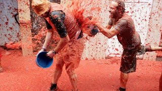 Spains annual Tomatina fight draws thousands [upl. by Jacobsen939]