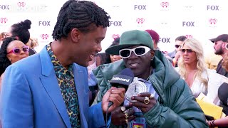 Flavor Flav Reveals Hes A Fan of Taylor Swift  iHeart Radio Music Awards 2023 [upl. by Uni]