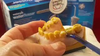 How to floss with a water flosser [upl. by Budworth169]