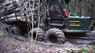 Forwarder Mini Bruunett with Belarus engine logging in wet forest [upl. by Akiem]