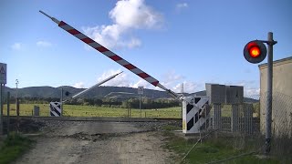 Spoorwegovergang Carbonia I  Railroad crossing  Passaggio a livello [upl. by Barby]