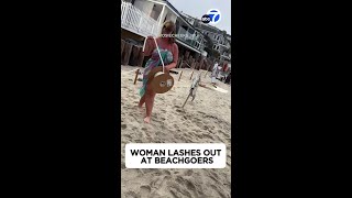 Woman lashes out at beachgoers [upl. by Ellatsirhc]