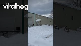 Building Roof Sheds Wet Snow  ViralHog [upl. by Eenafit]