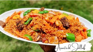 The most delicious Assorted Jollof Rice Recipe Ghana Jollof Recipe [upl. by Ykroc]