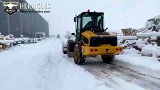 Heracles H580T Telescopic Wheel Loaders in the Snow  Low Cost Chinese Loader [upl. by Melentha]