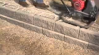 How to Build a Reinforced Retaining Wall Using Geogrid  YouTube [upl. by Deelaw]