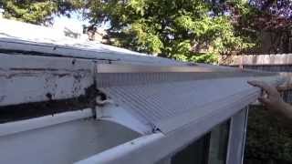 EasyOn Gutterguard Installing on a flat roof [upl. by Judenberg]