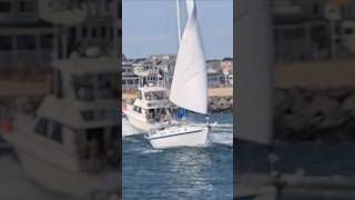 Sailboat Sets Sail As It Heads Through The Choppy Inlet [upl. by Ylatan]