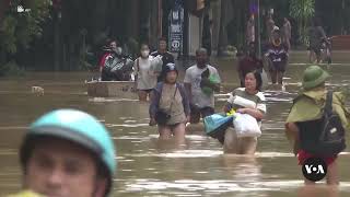 Drone shows flooded Vietnamese village after Typhoon Yagi  VOANews [upl. by Ellehcor]