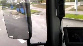 Turning left with a biarticulated bus seen from the drivers cabin [upl. by Krissie]