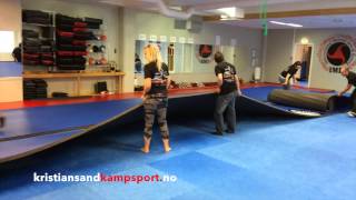 Setting up the new Dollamur mats Kristiansand Kampsport Senter Norway 2014 [upl. by Inoj]