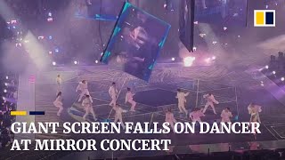 At least 2 people injured by giant video screen falling onto stage at Mirror concert in Hong Kong [upl. by Eceerehs]