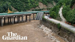 Bridge collapses in China amid floods leaving several dead and dozens missing [upl. by Edualcnaej]