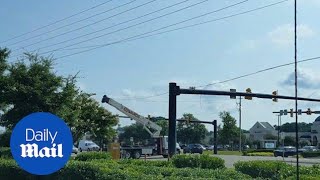 Truck with a crane takes out power lines and a traffic light [upl. by Merola]