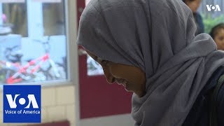 SomaliAmerican candidate for Congress Ilhan Omar votes in primary [upl. by Monson614]