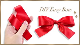 How to tie the perfect bow  DIY ribbon bow  How to make simple satin bow  Gift Wrapping Land [upl. by Lourdes722]