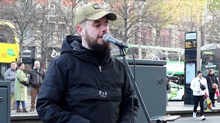 Belfast man John Garrity With A Beautiful Performance of Dublin Ballad quotGracequot on OConnell Street [upl. by Ymaral]