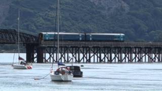 Barmouth Wales Arriva train DMU crosses River Mawddach Bridge 31 July 2015 [upl. by Cenac]