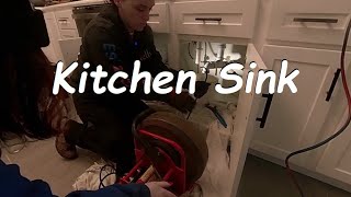 How We Snake A Clogged Kitchen Sink Drain 229 [upl. by Oivlis]