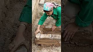 Building a stove with bricks and mudstraw mix [upl. by Dalila]