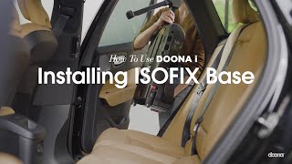 How to install the ISOFIX base  Doona i Car Seat amp Stroller [upl. by Adnotal]