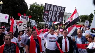 Mid Shot Demonstrators sing the Syrian national anthem [upl. by Innattirb810]