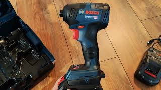 Unpacking  unboxing cordless impact driver Bosch GDR 18V200 C 06019G4106 [upl. by Adur]