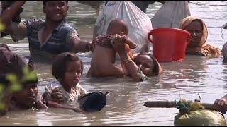 Rohingya refugees cross river to reach Bangladesh  VOANews [upl. by Aseiram438]