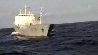 Tug towing stricken vessel [upl. by Araj]