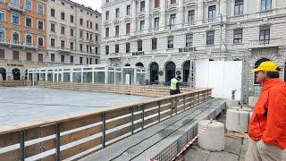 La preparazione della pista di pattinaggio su ghiaccio in piazza Ponterosso a Trieste [upl. by Akinahc]