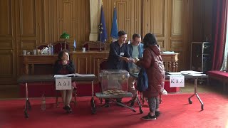 Voters cast first ballots as French polling stations open for European elections [upl. by Entwistle]